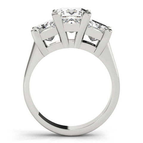 Platinum Three-Stone Heart Cut Diamond Ring with Channel Set Band and Four-Prong Setting