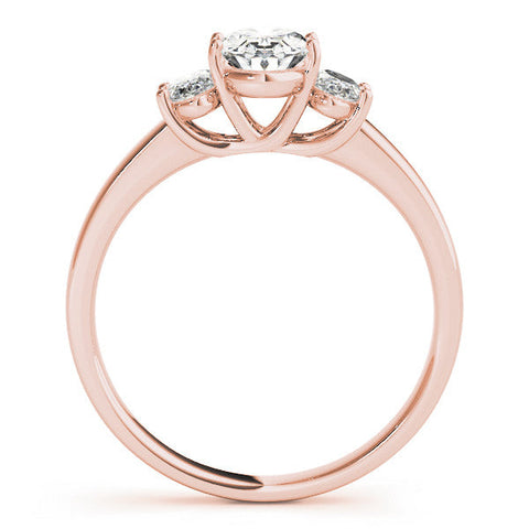 Rose gold Pear Three-Stone Diamond Ring with Prong Setting on a Classic Band