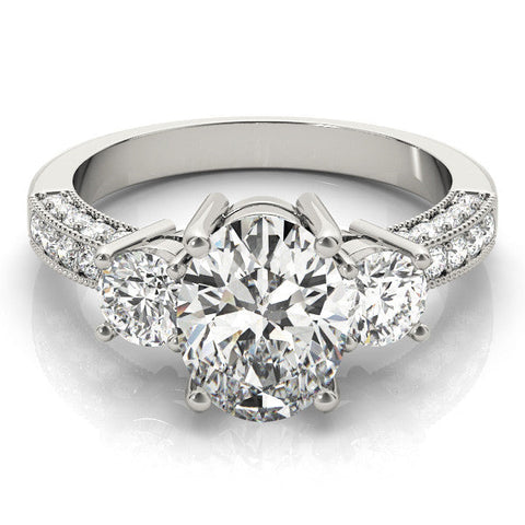 Platinum Round Three-Stone Diamond Ring with Pavé Band and Four-Prong Setting