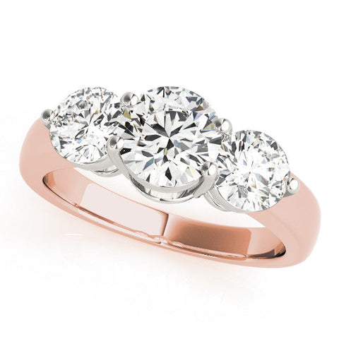 Rose gold Three-Stone Round Brilliant Cut Solitaire Ring with Prong Setting on a Classic Band