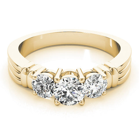 Yellow gold Three-Stone Round Cut Channel Set Diamond Ring with Four-Prong Setting