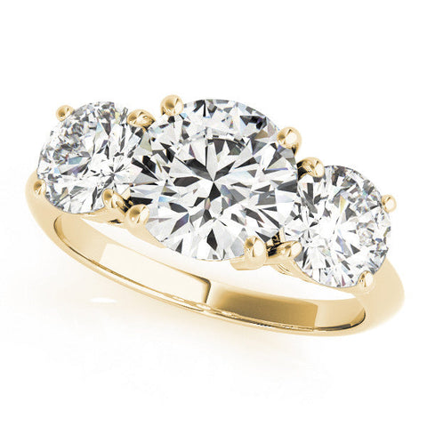Yellow gold Three-Stone Pear Cut Diamond Engagement Ring with Prong Setting on a White Gold Band