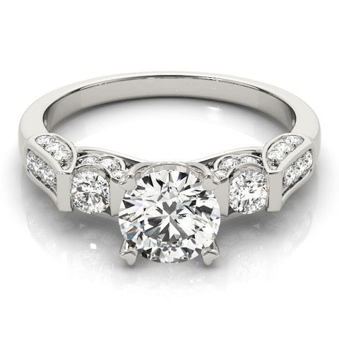 Platinum Round Brilliant Three-Stone Pave Band with Four-Prong Setting