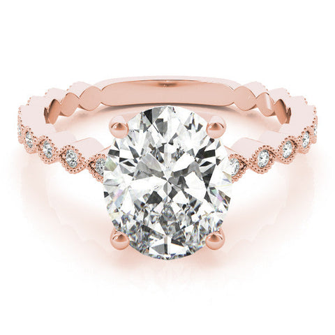 Rose gold Oval Solitaire Diamond Ring with Infinity Twist Band and Four-Prong Setting