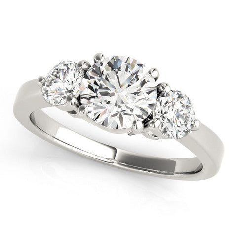 Platinum Three-Stone Round Cut Solitaire Ring with Prong Setting on a Classic Band