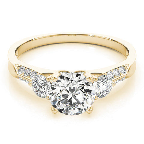 Yellow gold Round Brilliant Three-Stone Diamond Ring with Pavé Band and Four-Prong Setting