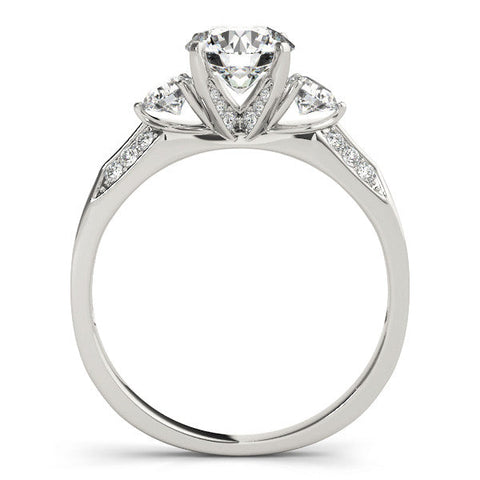 Platinum Round Brilliant Three-Stone Diamond Ring with Pavé Band and Four-Prong Setting