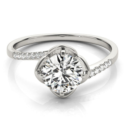 White gold Round Brilliant Solitaire with Pavé Band and Four-Prong Cushion Setting
