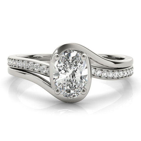 White gold Emerald Solitaire Diamond Ring with Split Shank and Prong Setting