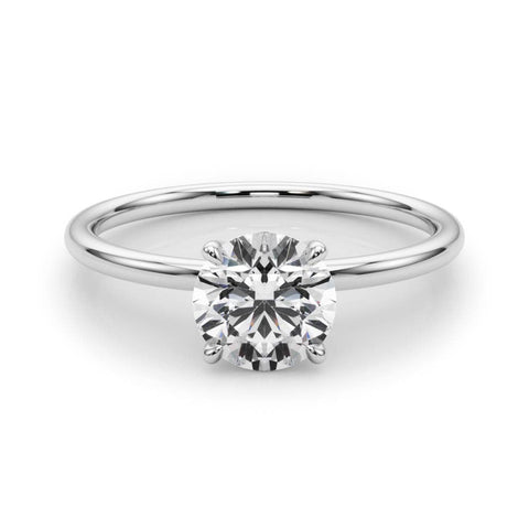 White gold Round Solitaire Diamond Ring with 4-Prong Setting on a Classic Band