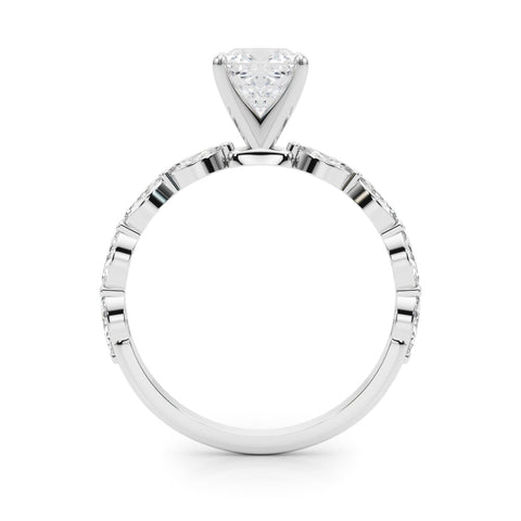 Platinum Cushion Solitaire with Side Stones on a Pavé Band and Four-Prong Setting