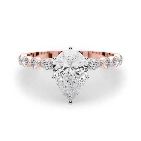 Rose gold Pear Solitaire with Side Stones on a Pavé Band and Four-Prong Setting