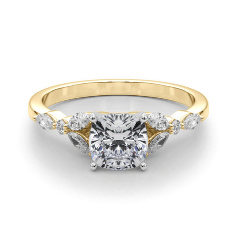 Yellow gold Cushion Diamond Solitaire with Side Stones on a White Gold Band and Four-Prong Setting