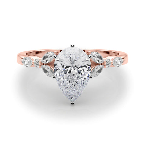Rose gold Pear Diamond Solitaire with Side Stones on a White Gold Band and Four-Prong Setting