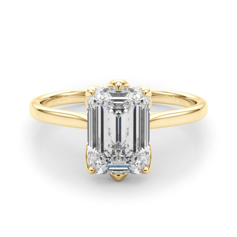 Yellow gold Pear Cut Solitaire Diamond Ring with Four-Prong Setting and Classic Band
