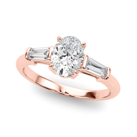 Rose gold Oval Cut Diamond Ring with Tapered Baguette Side Stones on a Platinum Band with Four-Prong Setting