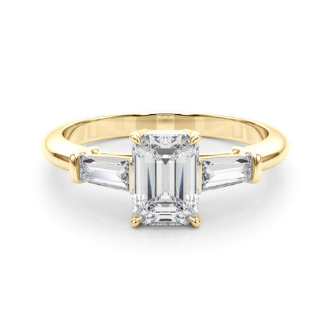 Yellow gold Pear Cut Diamond Ring with Tapered Baguette Side Stones on a Platinum Band with Four-Prong Setting