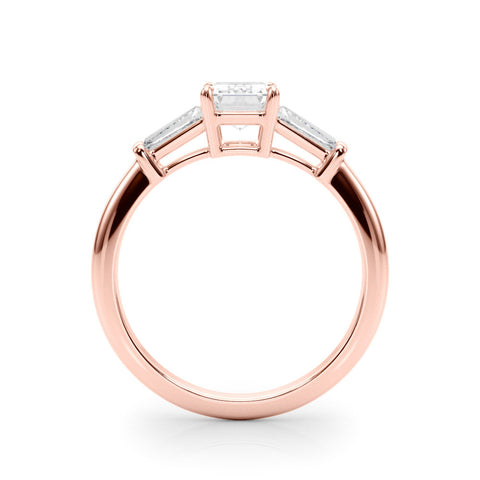 Rose gold Heart Cut Diamond Ring with Tapered Baguette Side Stones on a Platinum Band with Four-Prong Setting