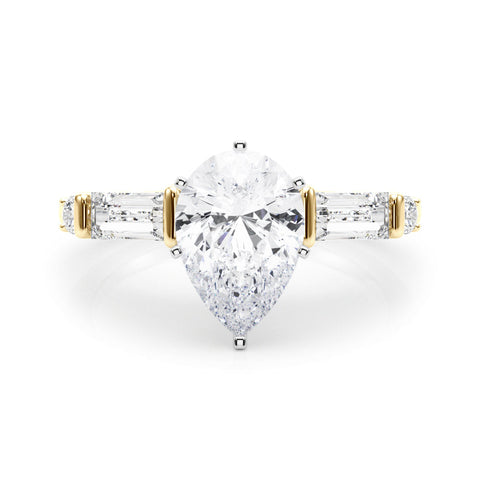 Yellow gold Pear Cut Diamond Ring with Baguette Side Stones, Channel Set Band, and Four-Prong Setting