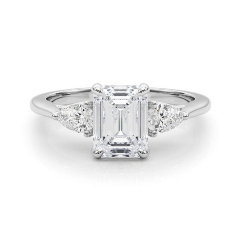 Platinum Three-Stone Cushion Cut Diamond Ring with Pear Side Stones on a Platinum Band and Four-Prong Setting