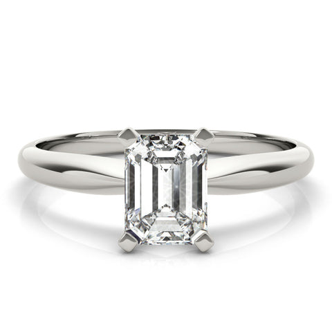 Platinum Emerald Cut Solitaire Ring with Four-Prong Setting on a Classic Band