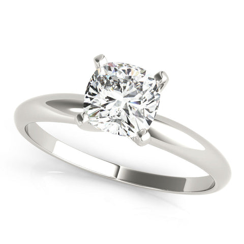 Platinum Round Cut Solitaire Engagement Ring with Round Band and Four-Prong Setting