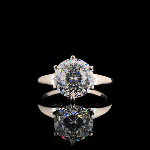 White gold Round Solitaire Diamond Ring with Six-Prong Setting and Tapered Band