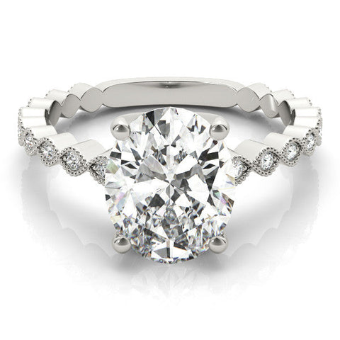 White gold Oval Solitaire Diamond Ring with Infinity Twist Band and Four-Prong Setting
