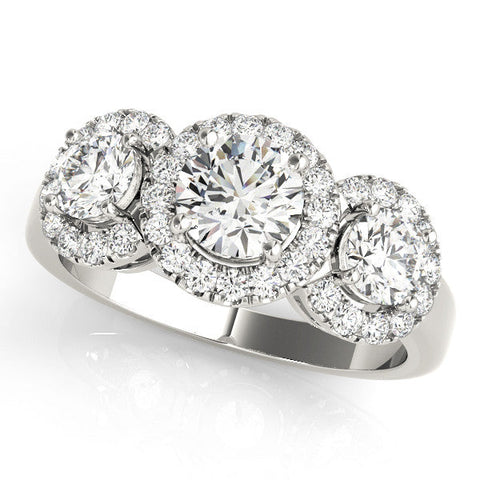 Platinum Three-Stone Round Halo Diamond Ring with Pavé Band and Four-Prong Setting