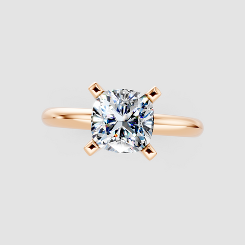Rose gold Cushion Cut Solitaire Engagement Ring with Round Band and Four-Prong Setting