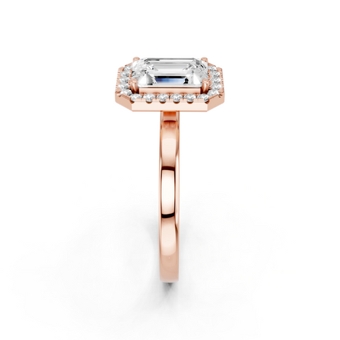 Rose gold Emerald Halo Diamond Solitaire with Pavé Band and Four-Prong Setting