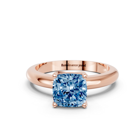 Rose gold Fancy Blue Cushion  Cut Solitaire Engagement Ring with Round Band and Four-Prong Setting