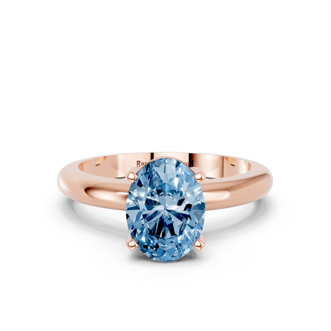 Rose gold Fancy Blue Oval  Cut Solitaire Engagement Ring with Round Band and Four-Prong Setting