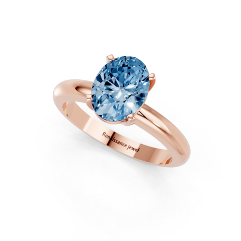 Rose gold Fancy Blue Oval  Cut Solitaire Engagement Ring with Round Band and Four-Prong Setting