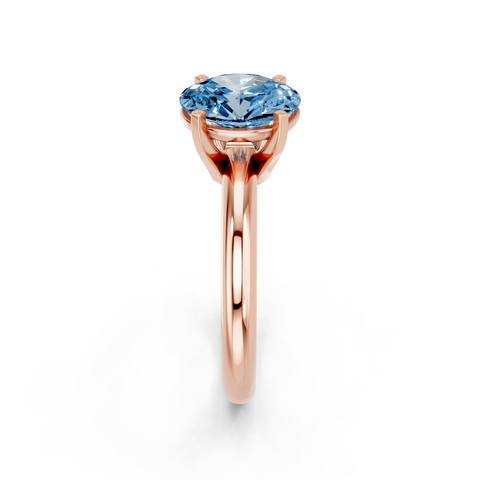 Rose gold Fancy Blue Oval  Cut Solitaire Engagement Ring with Round Band and Four-Prong Setting