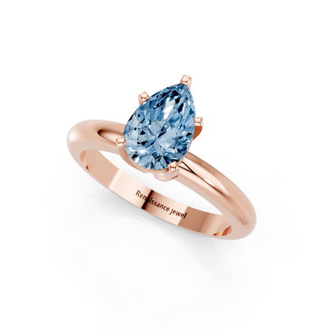 Rose gold Fancy Blue Pear  Cut Solitaire Engagement Ring with Round Band and Four-Prong Setting