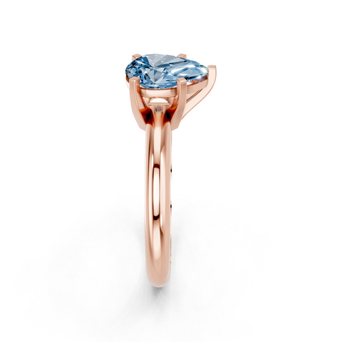 Rose gold Fancy Blue Pear  Cut Solitaire Engagement Ring with Round Band and Four-Prong Setting