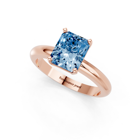 Rose gold Fancy Blue Radiant  Cut Solitaire Engagement Ring with Round Band and Four-Prong Setting