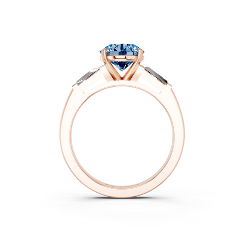 Rose gold Fancy Blue Round  Solitaire with Tapered Baguette Side Stones on a Classic Band with Four-Prong Setting