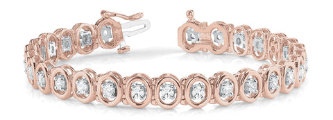 Yellow gold Oval Bezel Set Round Diamond Tennis Bracelet with Four-Prong Setting