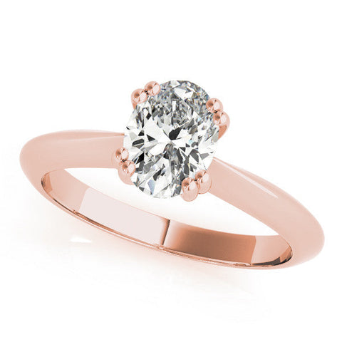 Rose gold Oval Solitaire Diamond Ring with Four-Prong Setting on a Tapered Band