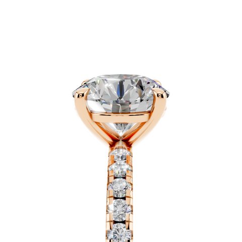 Rose gold Round Brilliant Solitaire with Pavé Band and Four-Prong Setting
