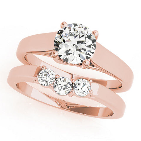 Rose gold Round Solitaire Engagement Ring with Tapered Band and Four-Prong Setting