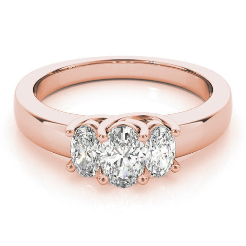 Rose gold Three-Stone Oval Diamond Ring with Channel Band and Prong Setting