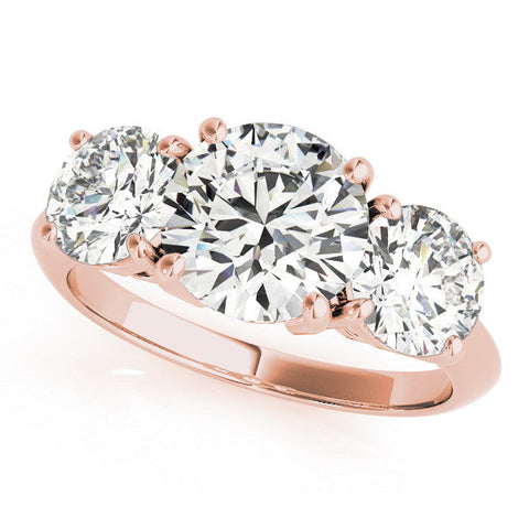 Rose gold Three-Stone Round Cut Diamond Engagement Ring with Prong Setting on a White Gold Band
