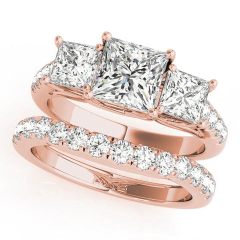Rose gold Three-Stone Princess Cut Diamond Ring with Pavé Band and Prong Setting