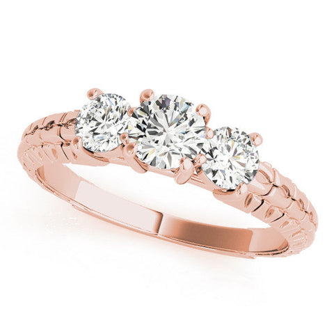 Rose gold Three-Stone Round Cut Diamond Ring with Channel-Set Band and Prong Setting