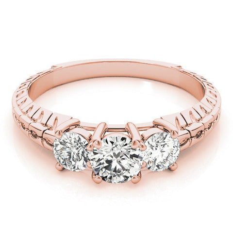 Rose gold Three-Stone Round Cut Diamond Ring with Channel-Set Band and Prong Setting