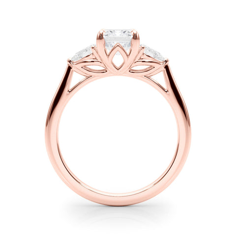 Rose gold Three-Stone Emerald Cut Diamond Ring with Pear Side Stones in Four-Prong Setting