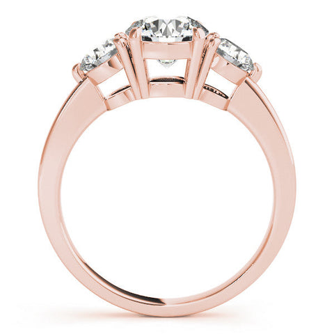 Rose gold Three-Stone Round Cut Solitaire Ring with Prong Setting on a Classic Band